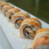 2010 Roll · dynamite roll topped w/ salmon & spicy mayo, bake-finished with wasabi mayo drizzle.