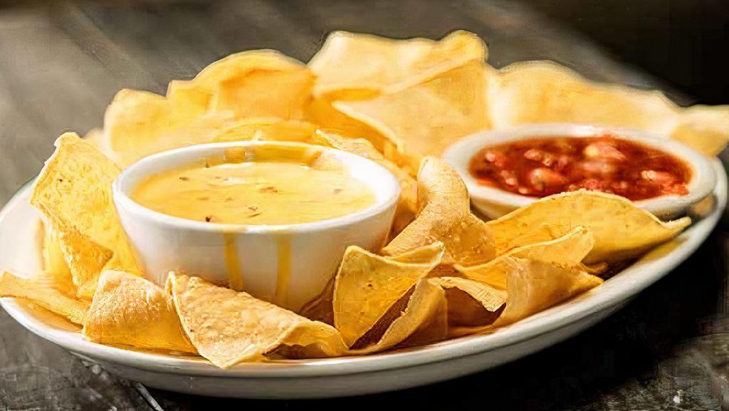 Chips & Queso · Fresh Fried Warm Chips! Hot or Mild.