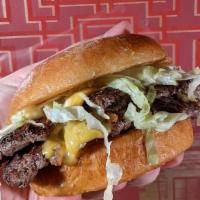 Cheeseburger · American Cheese, House Pickles, Dijonnaise, Shredded Lettuce *Impossible Plant-Based Patty a...