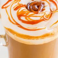 Iced Caramel Macchiato · An extra shot of espresso served over ice with vanilla, decadent caramel drizzle and creamy
...