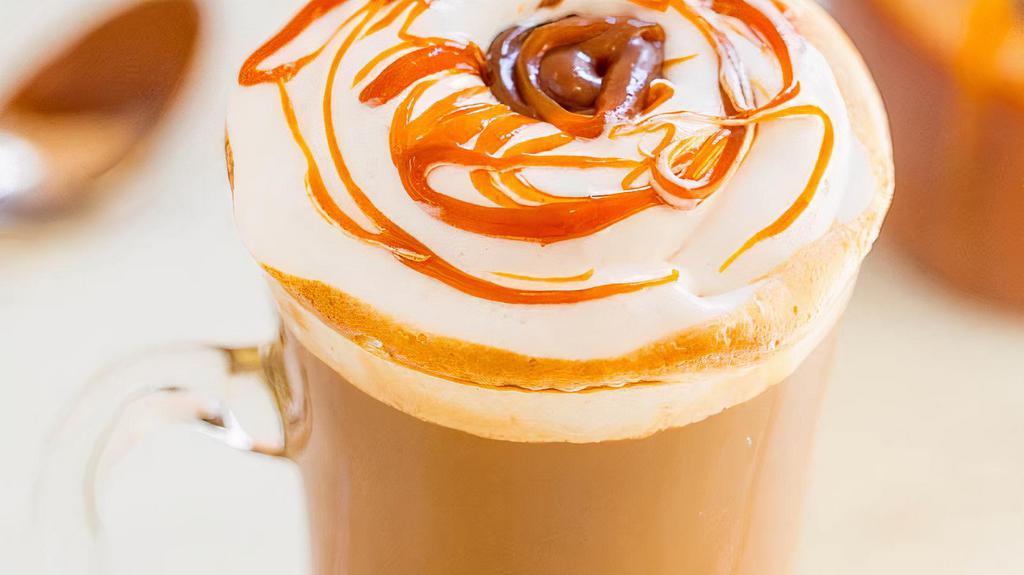 Caramel Macchiato · An extra shot of espresso layered on top of creamy, steamed milk with vanilla flavoring and loaded with caramel drizzle