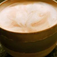 Mocha · Espresso shots mixed with rich dark chocolate and creamy, steamed milk
