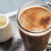 Chai · Warm spices mixed with creamy, steamed milk and topped with a dusting of cinnamon