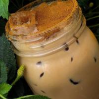 Iced Chai · Our spiced chai served over ice with creamy whole milk