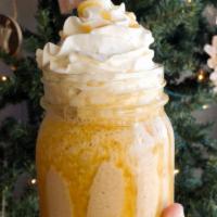Caramel Frappe · Caramel flavor blended together with ice, espresso, and milk. Topped with whip cream and
car...