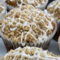 Banana Muffin · Enjoy a delicious banana muffin topped with streusel and icing.