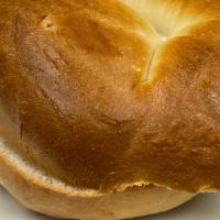Toasted Bagel · A toasted bagel with you choice of plain, everything, blueberry, and cinnamon raisin. You ch...
