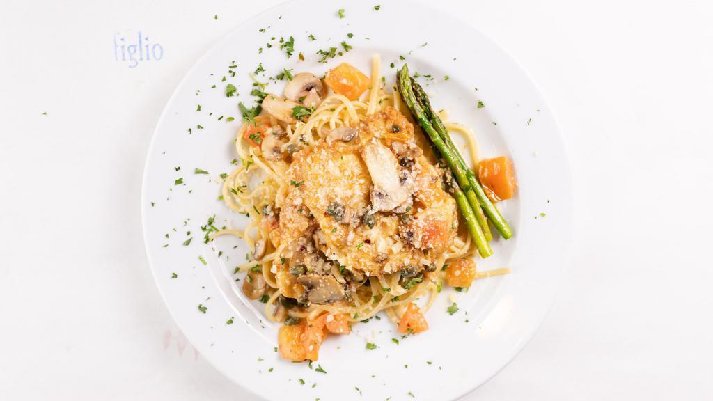 Chicken Piccata · Linguine, white wine butter sauce, capers, mushrooms, tomatoes, asparagus.