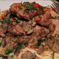 Chicken Marsala · Linguine, marsala cream sauce, shiitake mushrooms, sundried tomatoes, spinach.