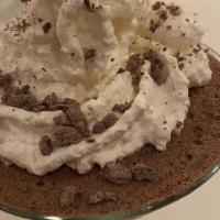 Chocolate Mousse · Mocha flavored topped with fresh whipped cream and chocolate shavings.
