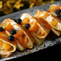Peaches N Cream  · Creamy crepe topped with glazed peaches.
