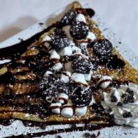 Oreo Crepe  · Crepe filled with a marshmallow filling, crushed Oreos, and then topped with whipped cream, ...