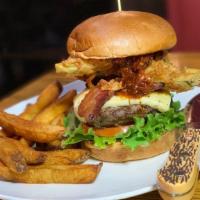 Buck’S Fried Pickle Burger · Thick slab’s of brown sugar bacon, white cheddar cheese, iceberg lettuce with tomato jam top...