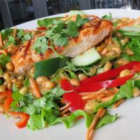 Thai Salmon Salad · Gluten-sensitive. Mixed greens, grilled salmon, cucumbers, cilantro, carrots, red peppers, s...