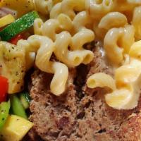 Pitchfork Ranch Meatloaf-N-Mac Lunch Size · Chef’s special meatloaf, gouda mac-n-cheese, mashed potatoes, demi sauce, with grilled veget...