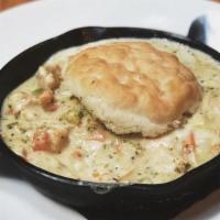 Chicken Pot Pie Risotto · Grilled chicken breast fanned over creamy pot pie risotto with buttermilk biscuit