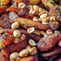 Kelewele · Chunks of well seasoned ripe plantains fried and served with peanuts