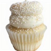 Wedding Cake · Perfectly simple vanilla cake topped with our signature homemade buttercream and sprinkled w...