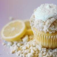 Lemon Crumble · Sweet lemon cake filled with tangy whipped cream, topped in smooth cream cheese rimmed with ...