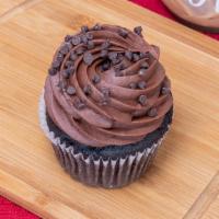 Midnight Magic · Super moist semi-sweet chocolate cake topped with silky chocolate buttercream and a handful ...