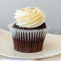Vanilla Creme De Cocoa · Chocolate cupcake topped with our signature French vanilla buttercream and sugar.