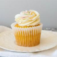 French Vanilla · Vanilla cupcake topped with our signature French vanilla buttercream and colored sugar.