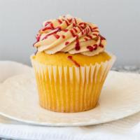 Peanut Butter & Jelly · Vanilla cupcake topped with a layer of raspberry jam, a swirl of peanut butter buttercream a...