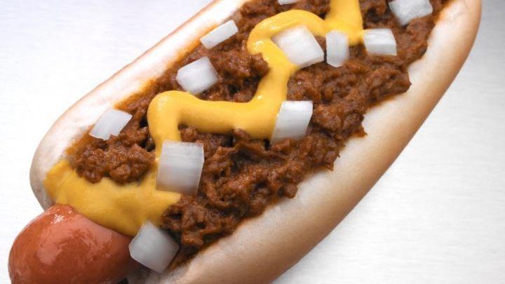 Classic Coney Dog · Our own special brand of natural casing hot dog grilled to perfection and topped with our world famous chili, mustard and freshly diced onions, all packed in a steamed hot dog bun!