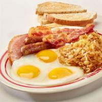 The Big Breakfast · Three eggs, two strips of bacon, two sausage links or one patty, grilled ham, hashbrowns, to...
