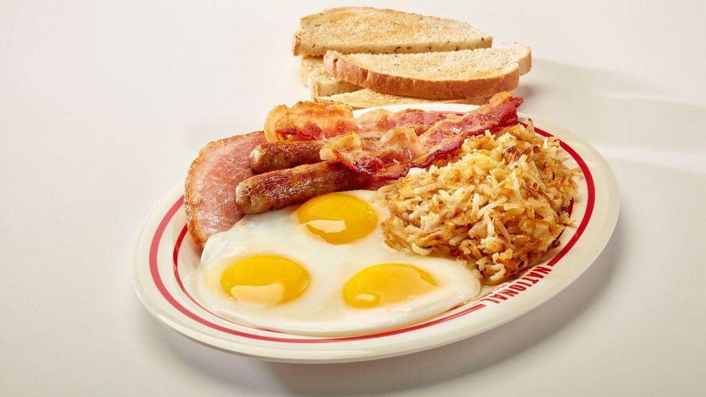 The Big Breakfast · Three eggs, two strips of bacon, two sausage links or one patty, grilled ham, hashbrowns, toast & jelly.