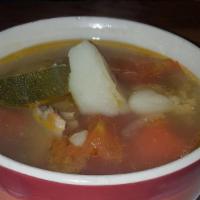 Caldo De Pollo · Delicious chicken soup served with two pieces of chicken and fresh cooked vegetables rice an...