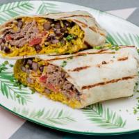 Burrito · A large flour tortilla stuffed with beans lettuce and tomato. sour cream is served on the si...