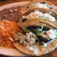 Tacos · Three crispy or soft tacos with your choice of pork, steak, chicken, beef, or al Pastor.