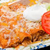 Enchiladas · Three of the original cheese and onion enchiladas garnished with Queso fresco and veggies on...