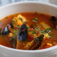 Spicy Seafood Soup · Shrimp, scallops, and mussels in spicy broth.