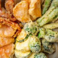 Vegetable Tempura Entree · Deep fried battered vegetables. Served with miso soup, ginger dressing salad, and rice.