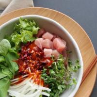 Spicy Sashimi Rice Bowl · Chopped assorted raw fish, vegetable and spicy house sauce over rice bowl. Served with miso ...