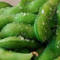 Edamame · Steamed young soybeans in pods. Lemon salt or garlic chili.