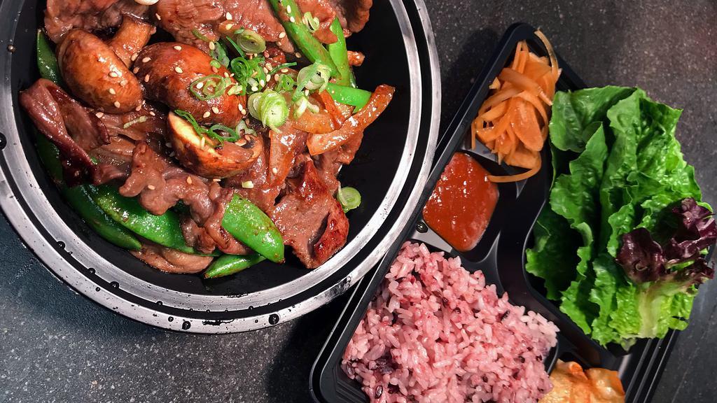 Beef Bulgogi · Thinly sliced marinated beef chuck, grilled with snap peas, mushrooms, onions, carrots, and scallions.