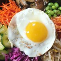 Bibimbap · Vegan, gluten-free. Beef or mushroom rice, carrot, zucchini, bean sprout, edamame, daikon ra...