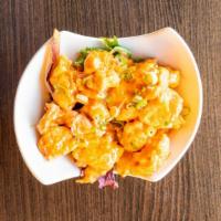 Rock Tempura Shrim P · Crispy rock shrimp served on mixed greens with rock shrimp tempura sauce, topped with scalli...