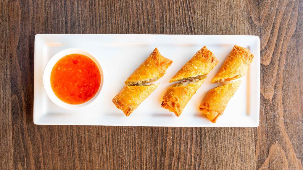 Harumaki Egg Roll · Egg rolls with pork and vegetables served with a sweet chili sauce (3pc)