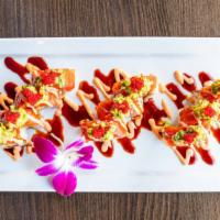 Titanic Roll* · Yellowfin tuna, salmon, yellowtail, cilantro, wrapped with spicy tuna, topped with an avocad...