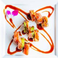 Red Dragon Roll* · Spicy tuna, shrimp tempura, gobo, wrapped in tuna, freshwater eel, and avocado, topped with ...