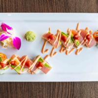 New York Roll* · Spicy tuna, cucumber, gobo, wrapped with yellowfin tuna and avocado, topped with spicy mayo ...