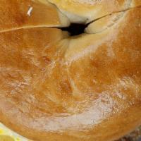#1 Egg, Monterey Jack & Sausage On A Plain Bagel · Boiled and baked round bread roll.