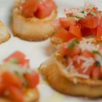 Brenda’S Bruschetta · Diced tomatoes, garlic, basil, olive oil on homemade toast points.