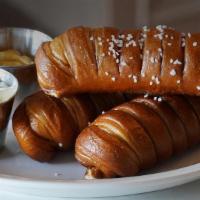 Bavarian Soft Pretzels · Served with Spicy Mustard and Queso Cheese