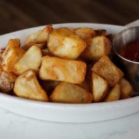 Fried Potatoes · Garlic and herb seasoned potatoes. Flash fried for a crispy outside, pillowy inside. Lightly...