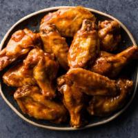 Bone-In Wings 50 Ct · Made to order and hand-tossed in your favorite sauce or rub. Choose between plain (no sauce)...